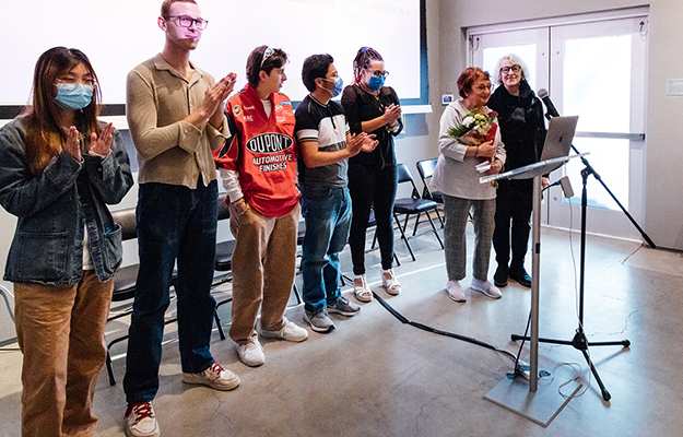 Otis College students present their renderings of stories by Eastern European immigrants at the Wende Museum