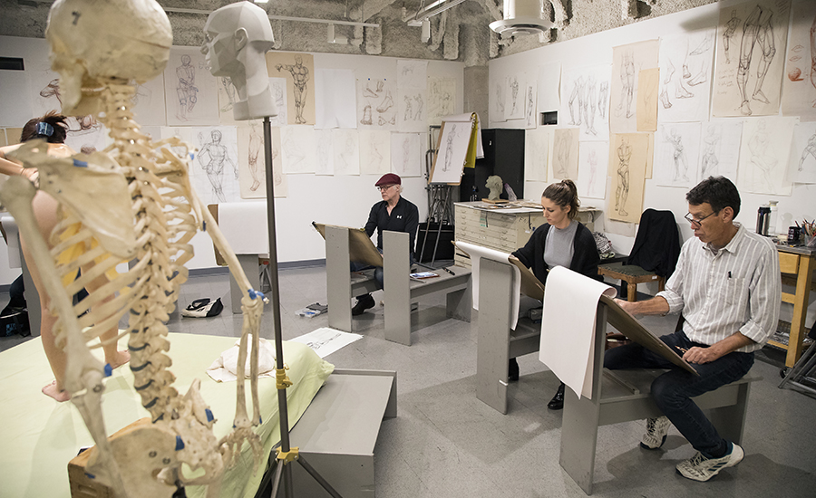 Students drawing in class