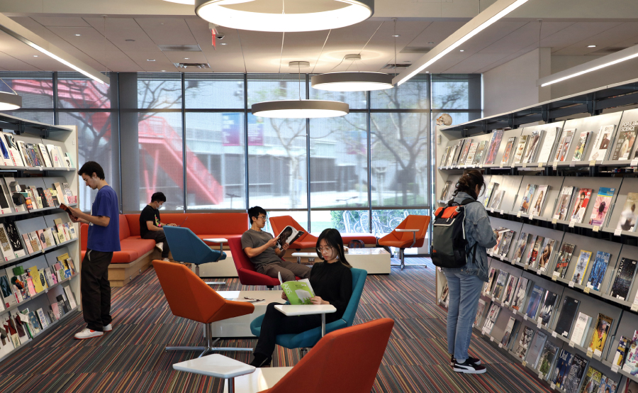 Otis College students browse books and magazines in the campus library.