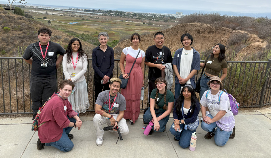 FirstGen First Flight students on a nature walk with Joanne Mitchell, Associate Provost of Educational Effectiveness and Enrollment Management (back row, third from left). Photograph by Elizabeth Boretz