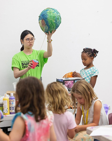 mentor teaching kids