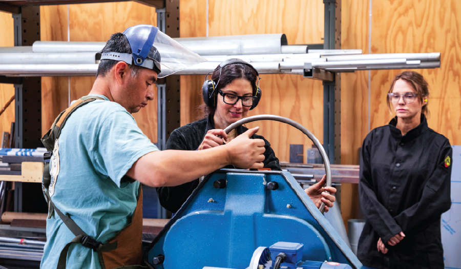 Otis students working in the wood and metal shop