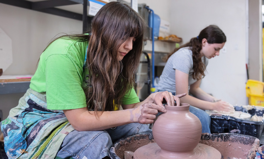 Summer of Art student in ceramic class