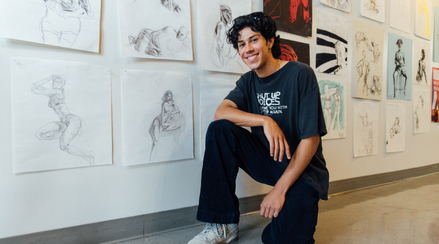 Student exploring the 2024 Summer of Art Final Exhibition artwork