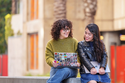 Two Students chatting on campus