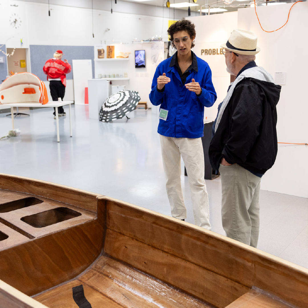 Student speaking with employer