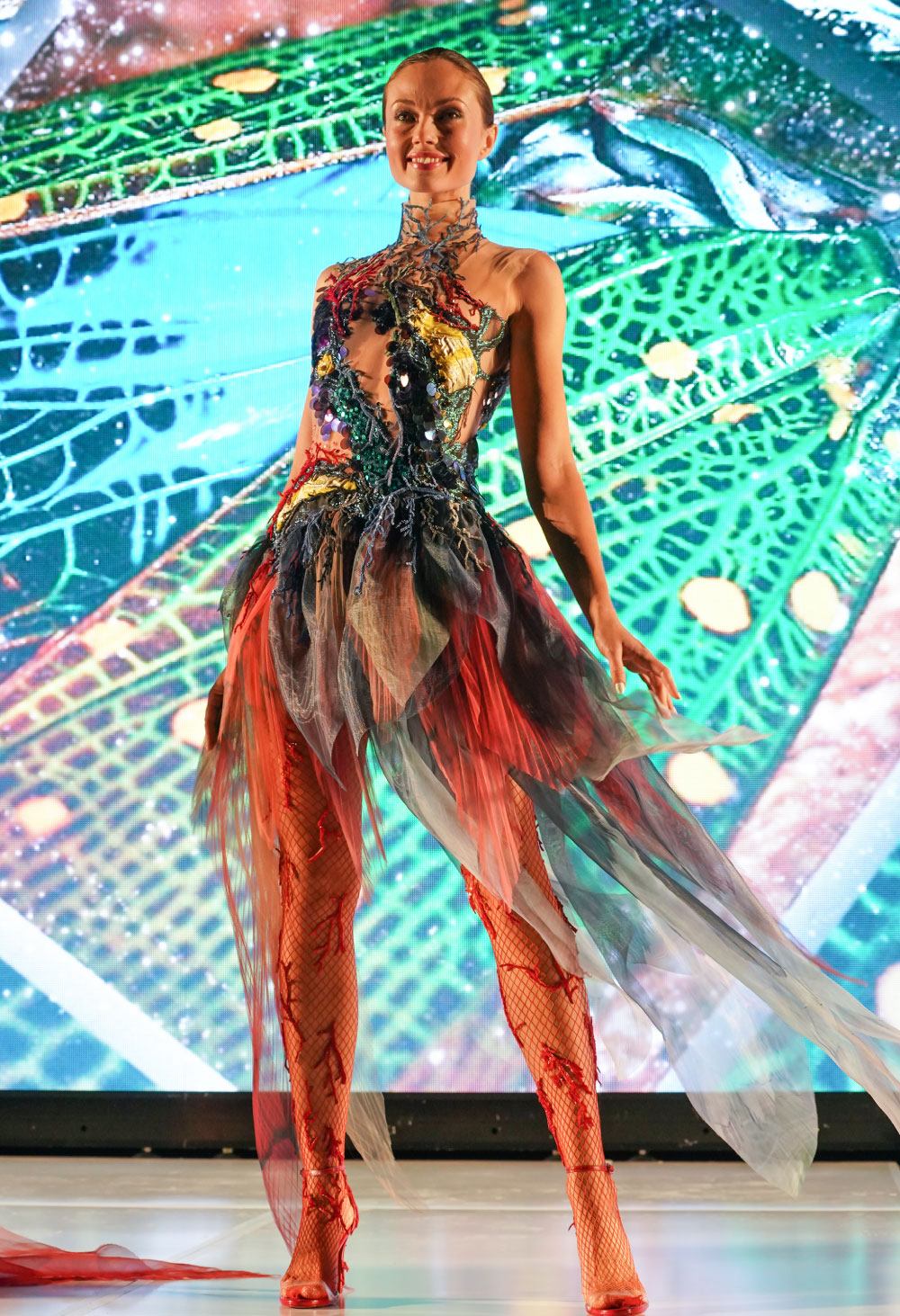 Model wearing a colorful dress