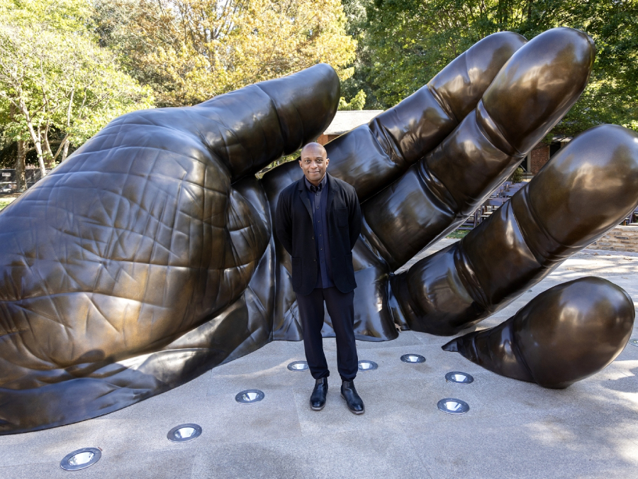 Thomas at the dedication for With These Hands: A Memorial to the Enslaved and Exploited (2025); Image from Davidson College; photograph by Christopher Record and John Gomez.