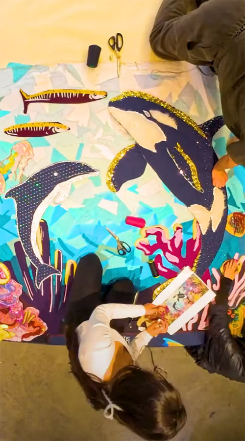 Students working on a mural for Sea World