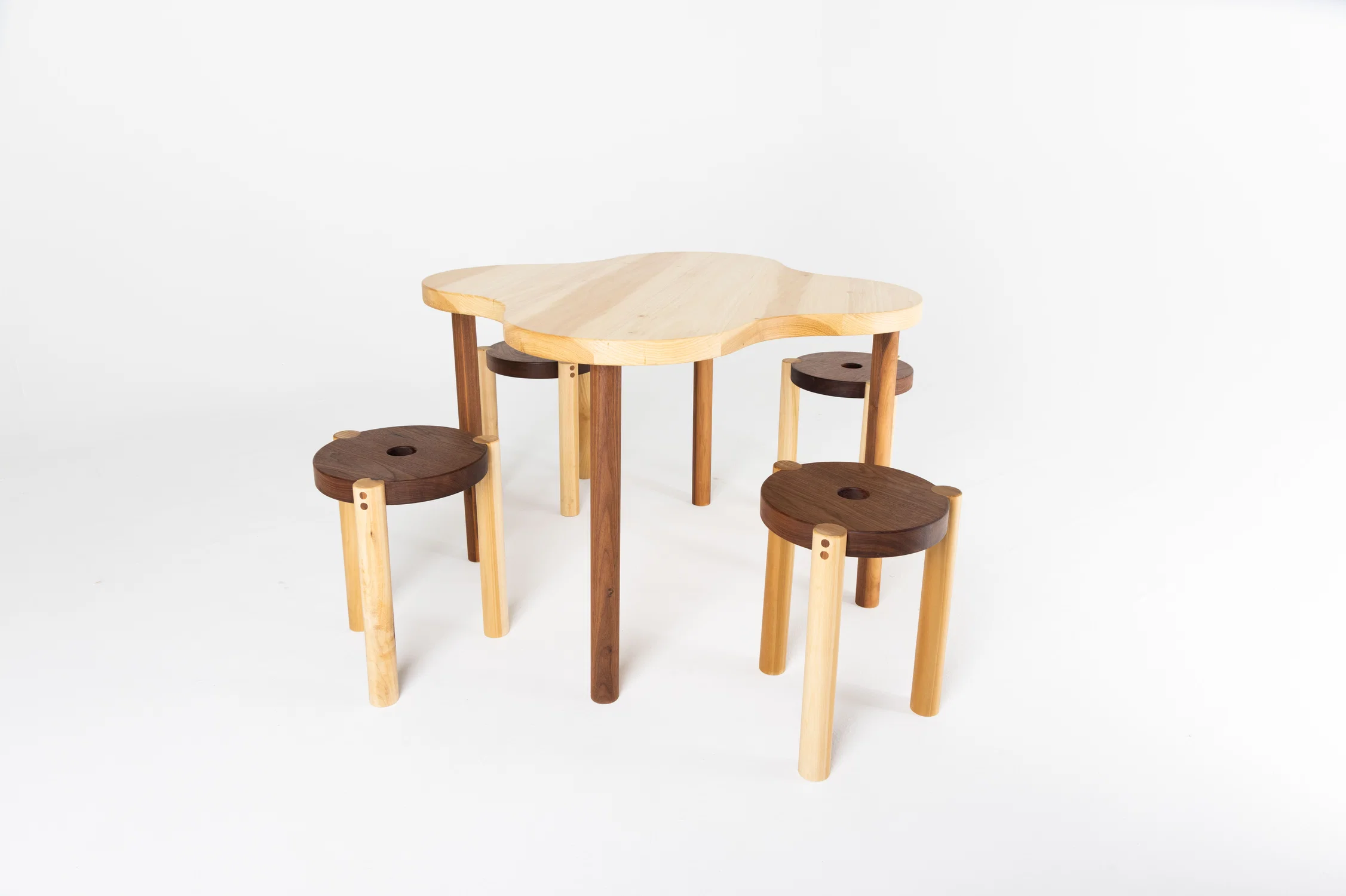 Four stools around a table.