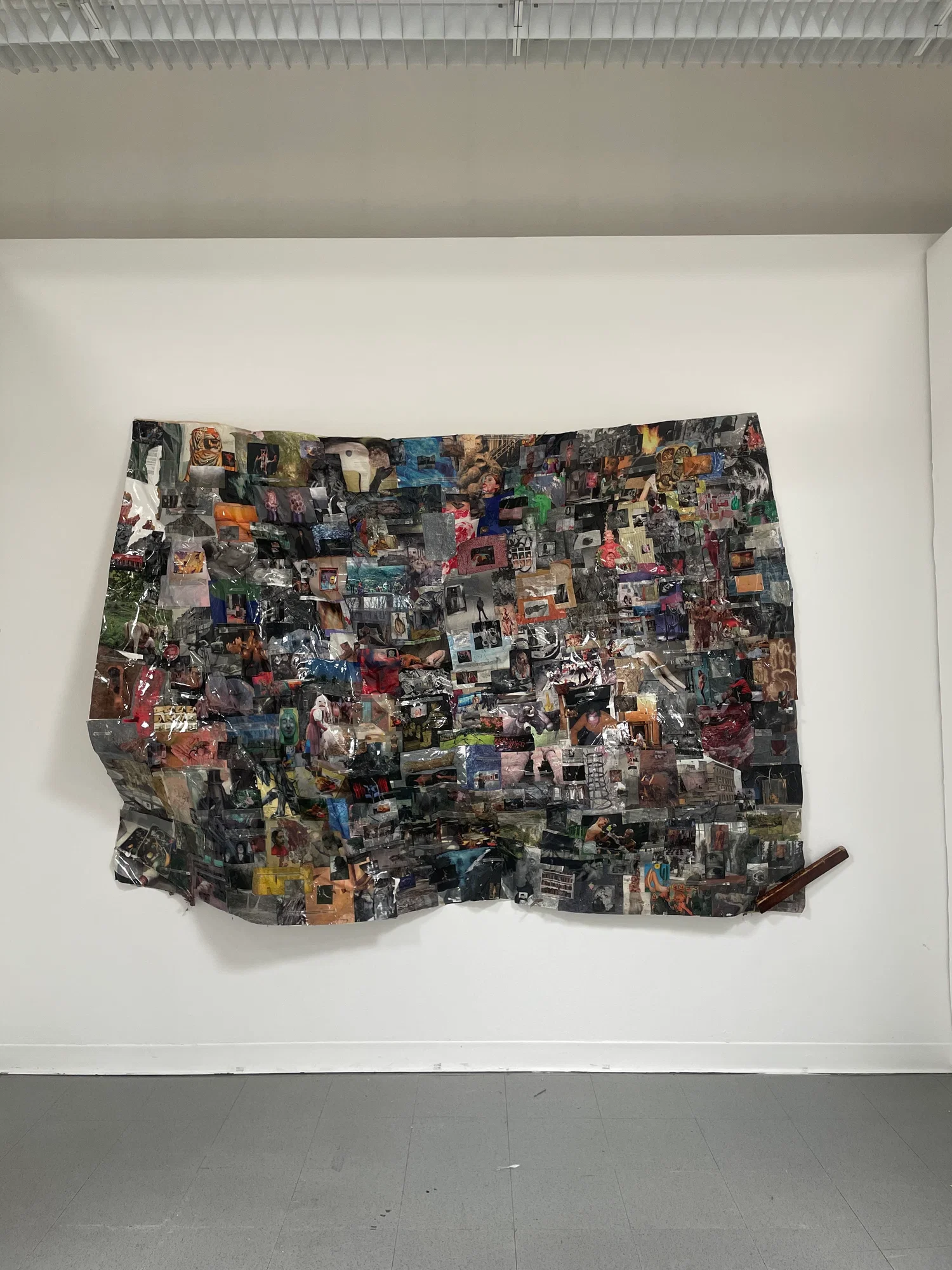 Large scale collage covered in resin. Uses found and sourced imagery as well as personal writing and dream recordings. Final result manipulated by wind.