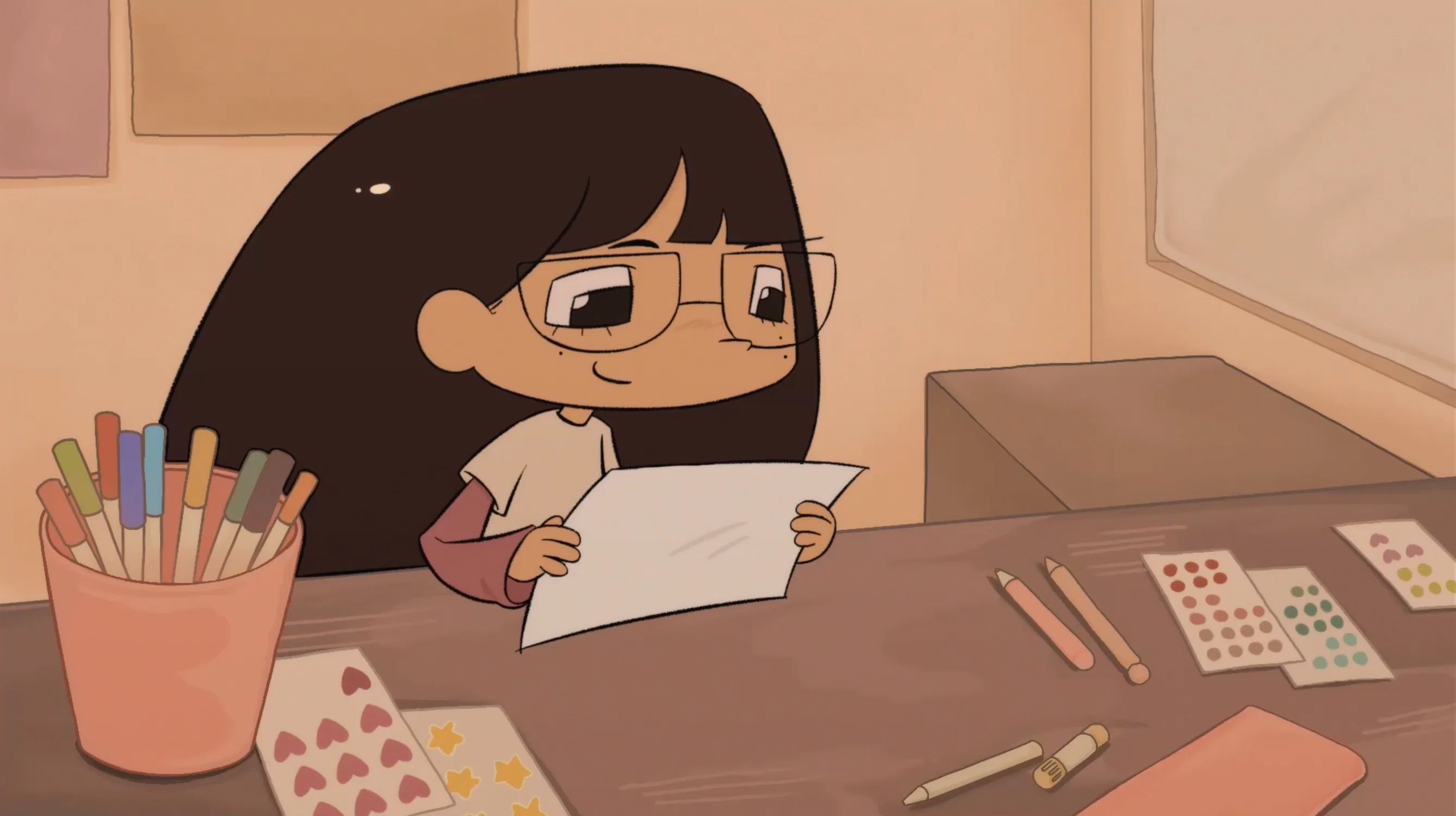 The opening shot for my senior show invite that is part of a small animation. It features me at my desk preparing to scrapbook.