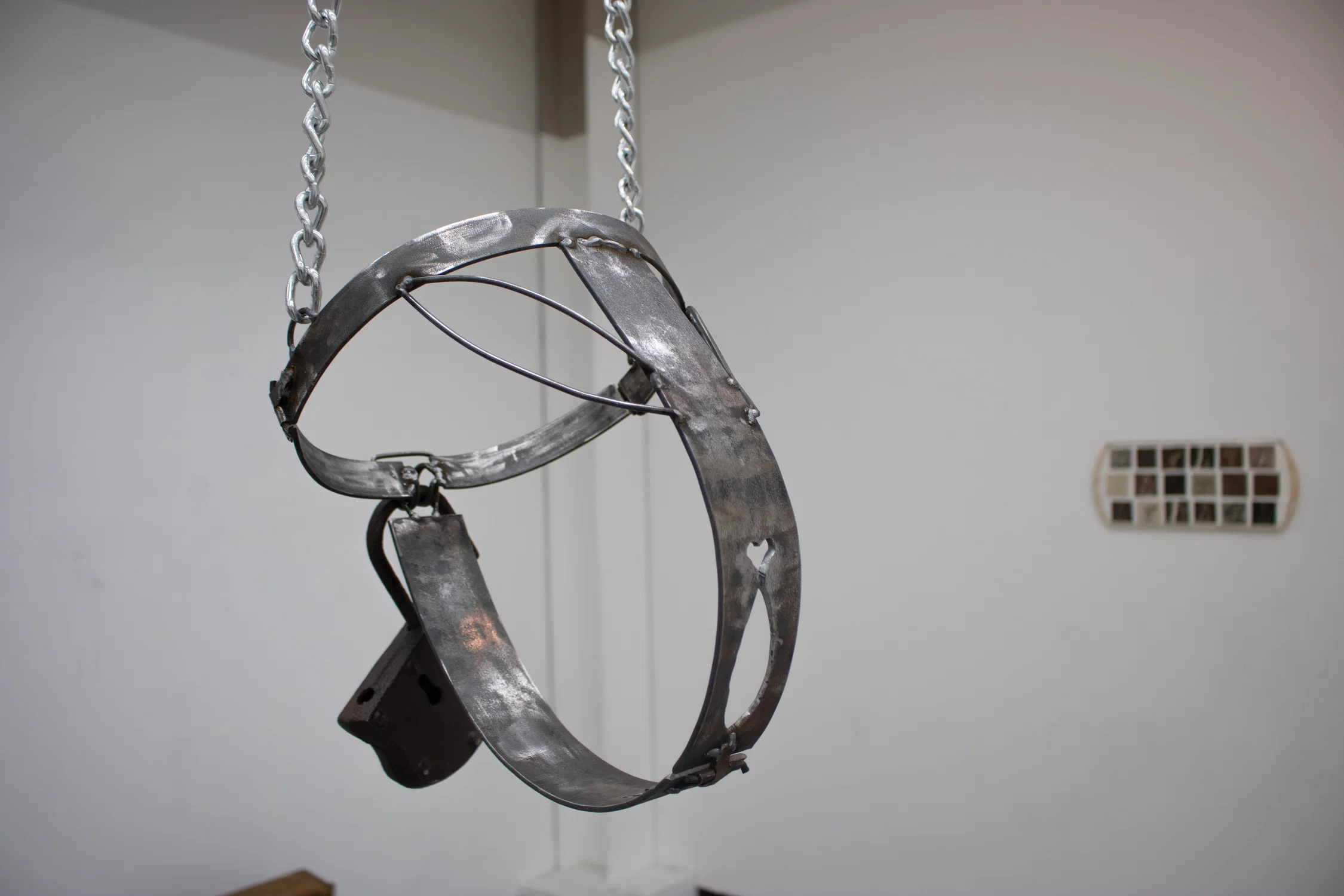 Object of Chastity, 2025 Steel, chain Dimensions Variable