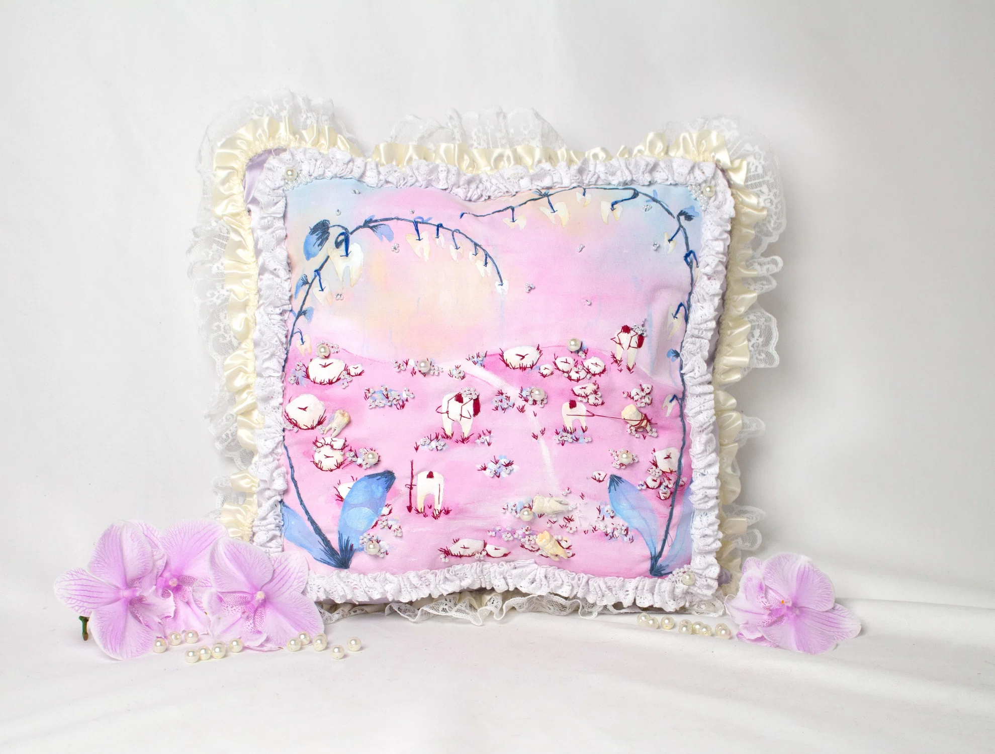 A pillow, sculptural piece depicting the feeling of loosing teeth as a kid.