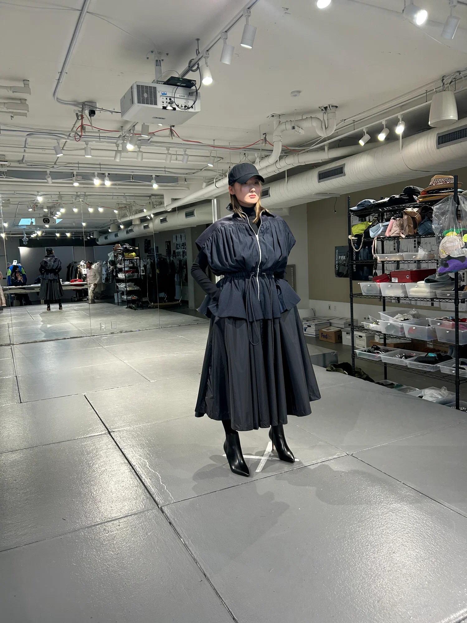 A photo of a model wearing a slightly modified look from the FIFA lineup.