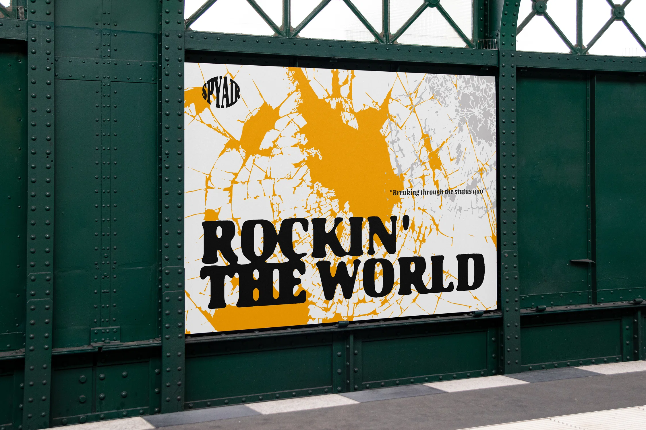 Large-scale poster application demonstrating how the visual system extends into a public environment, with bold typography and fractured textures ensuring clarity and impact from a distance.