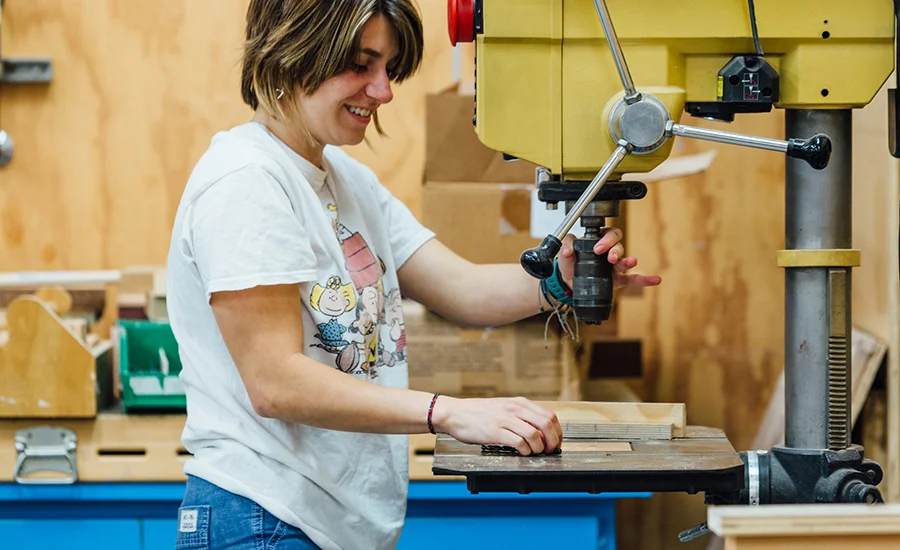 Student using machinery