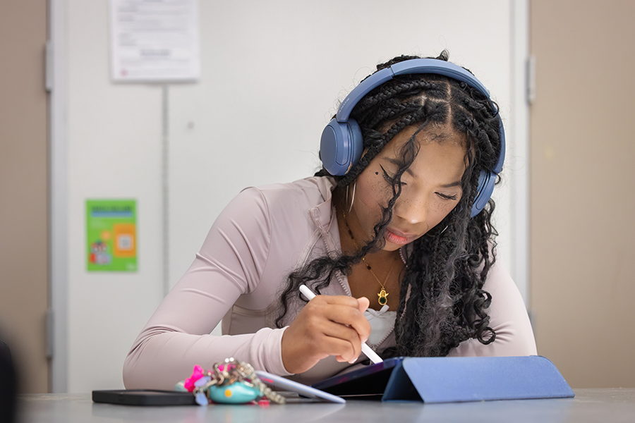 Student working on digital pad