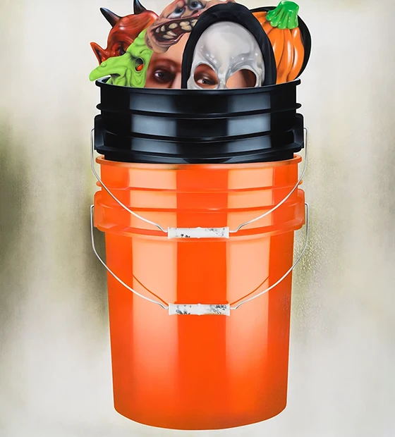 Work by Aaron Jupin: Masks in orange construction buckets