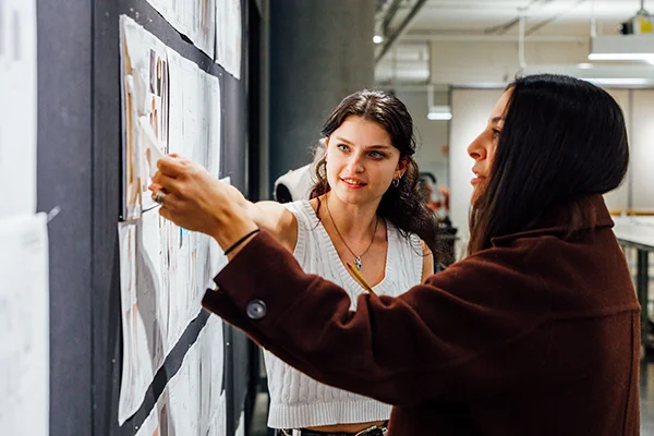 Student looking at artwork