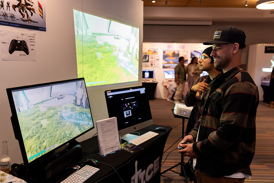 Students playing games at an expo