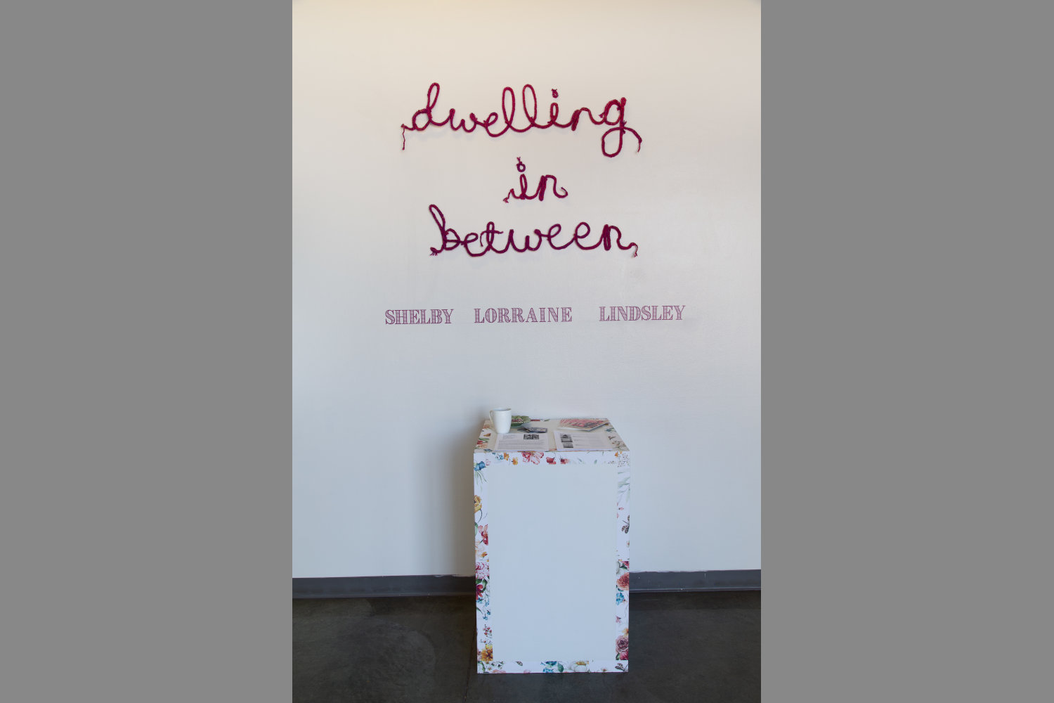 Shelby Lindsley art exhibit: signagge for "Dwelling In Between " 