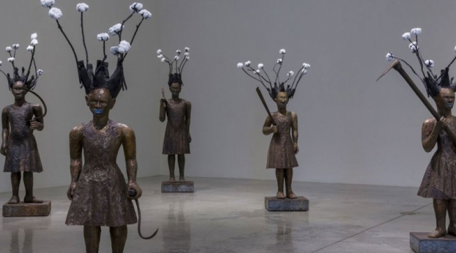 An installation shot of five sculptures by Alison Saar