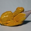 Mixed media shaped in the form of yellow pencil, and tied in a knot.