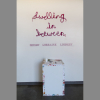 Shelby Lindsley art exhibit: signagge for "Dwelling In Between " 