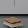 Kinetic, architectural model, box, ashes, magnet, antenna, Roomba, corporeal capsule.